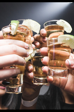 Bucks Party Playing Drinking Games with Shots drinking games being played at a bachelor party