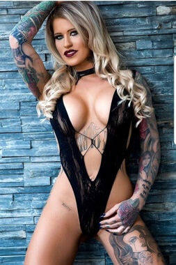 topless bargirl wearing very revealing swimsuit in sydney's drummoyne